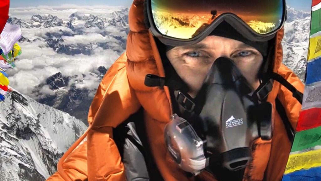 Alex Harz on the Summit of Mt. Everest while filming THE QUEST Nepal documentary 1030x580 1
