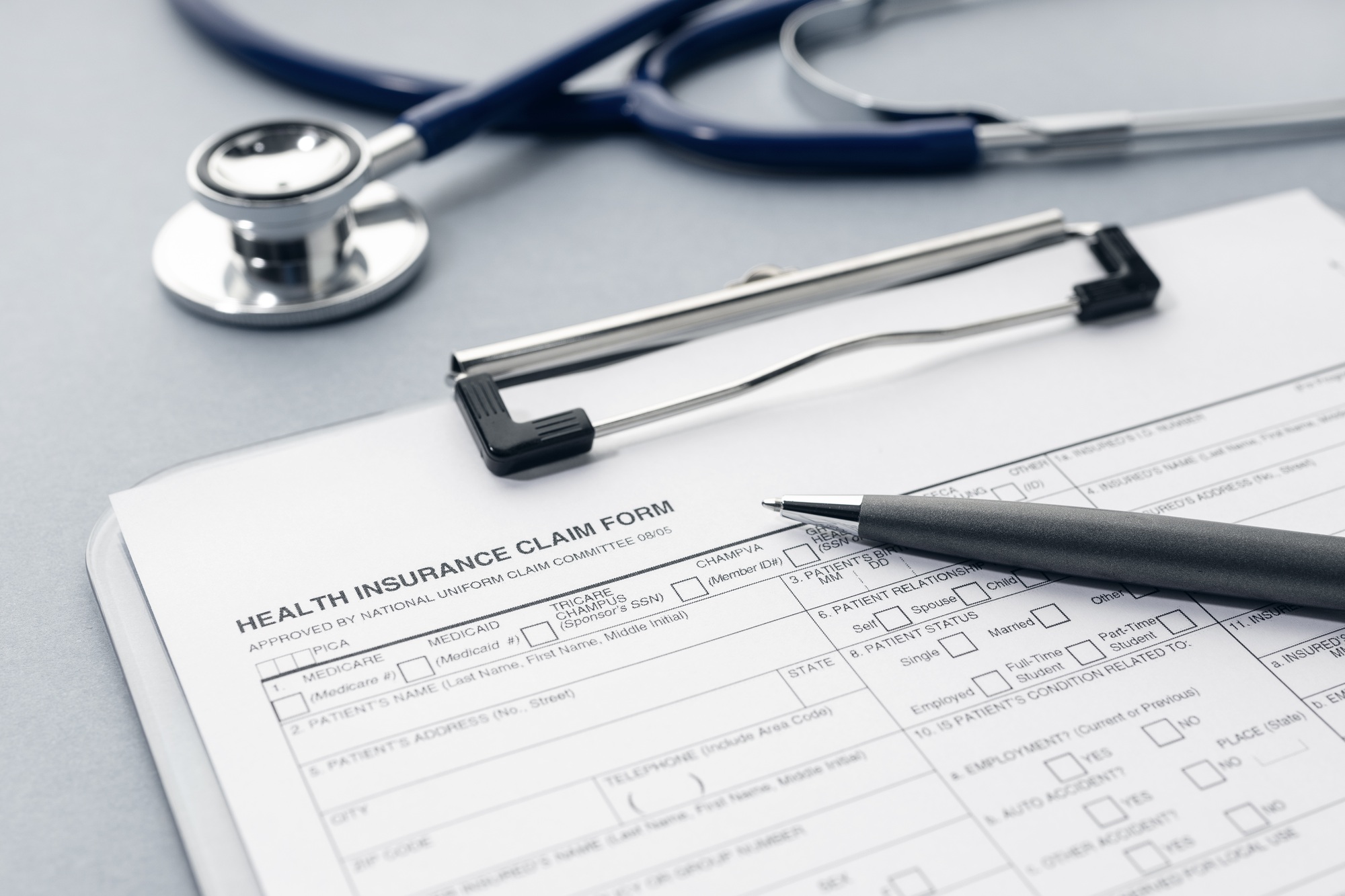 health insurance claim form on desk